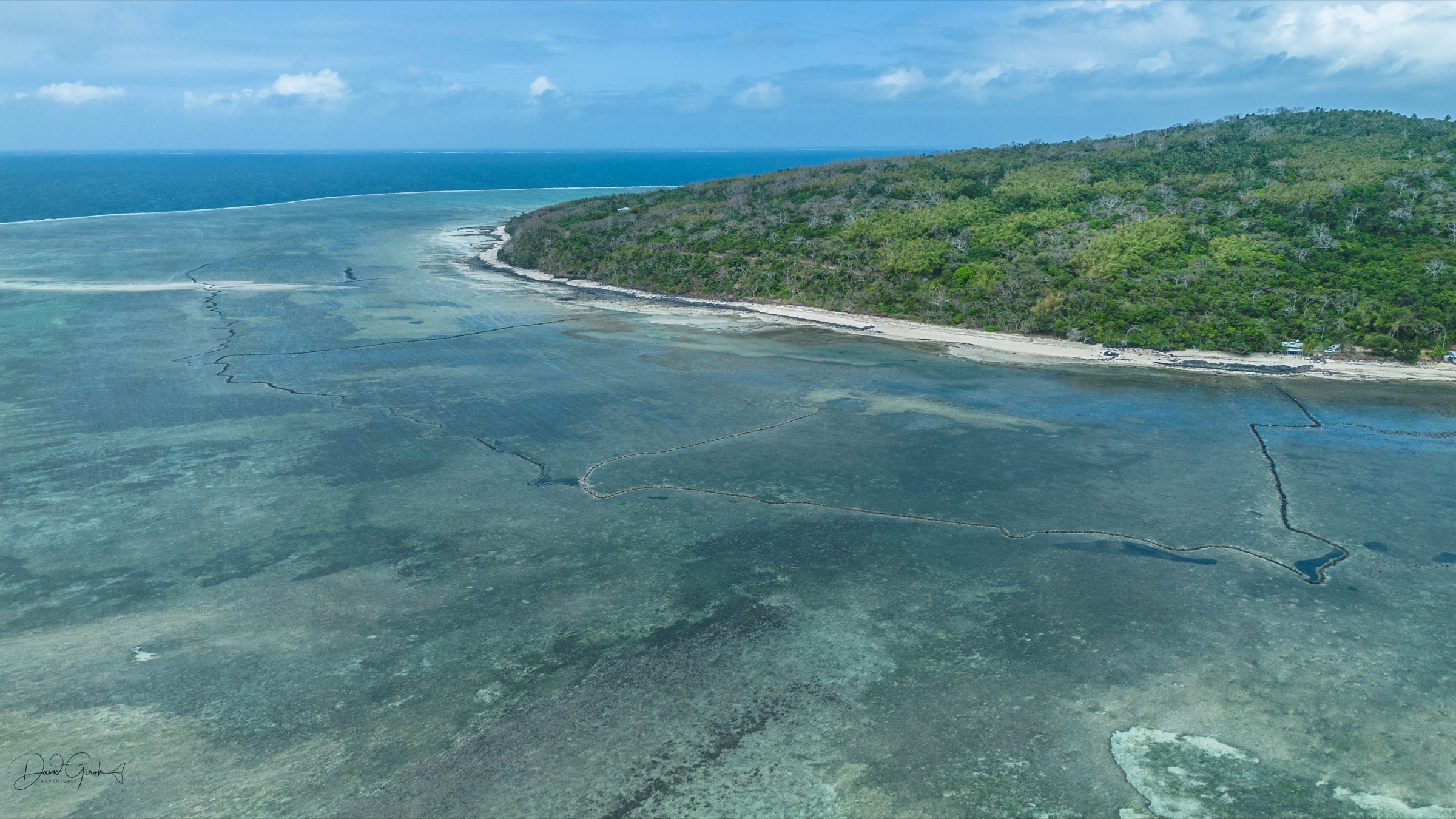 Aerial view of Mer Island coastline and reef, Torres Strait