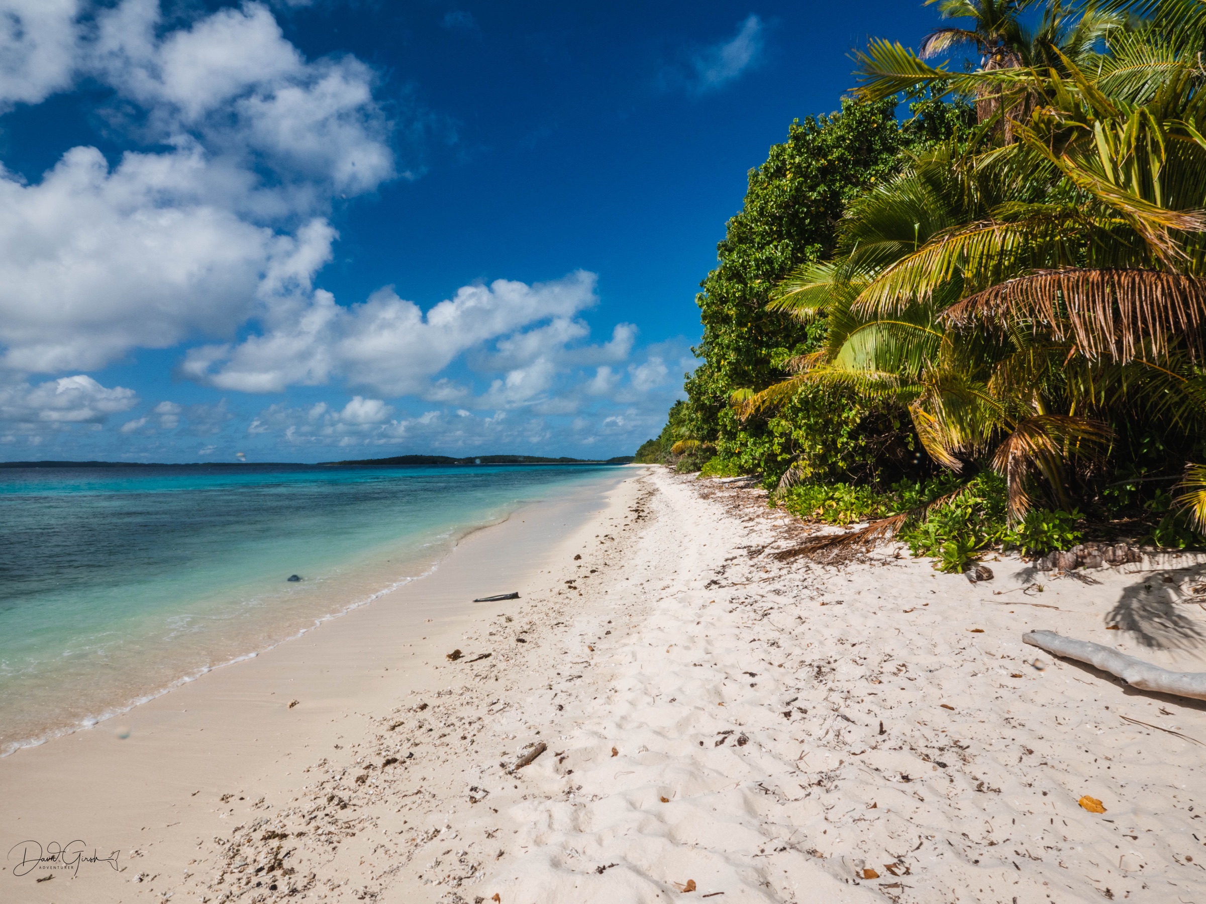 An empty white sand beach on a remote island in the Vava'u group