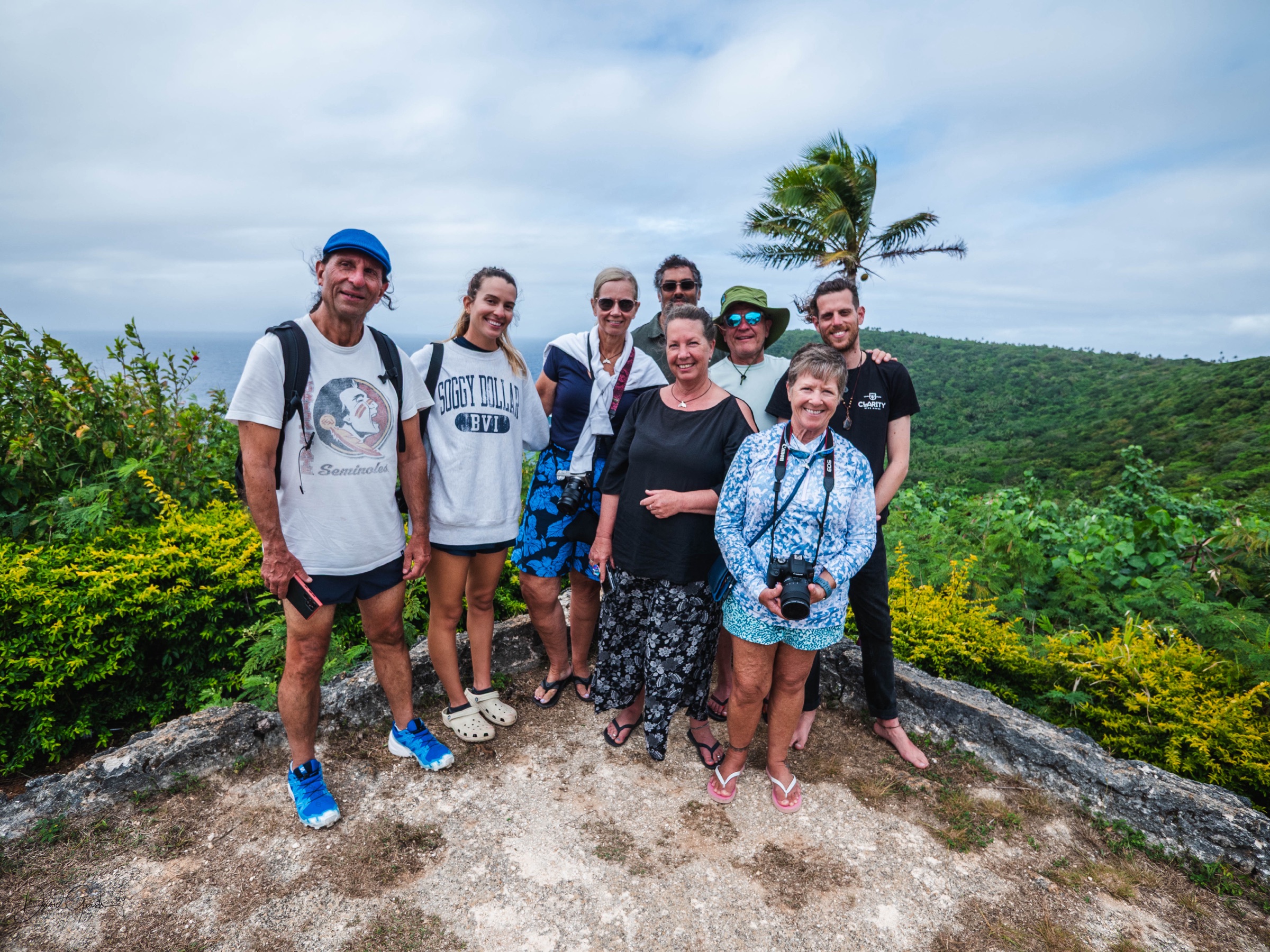 The group gathered at a clifftop lookout above the ocean on Vava'u