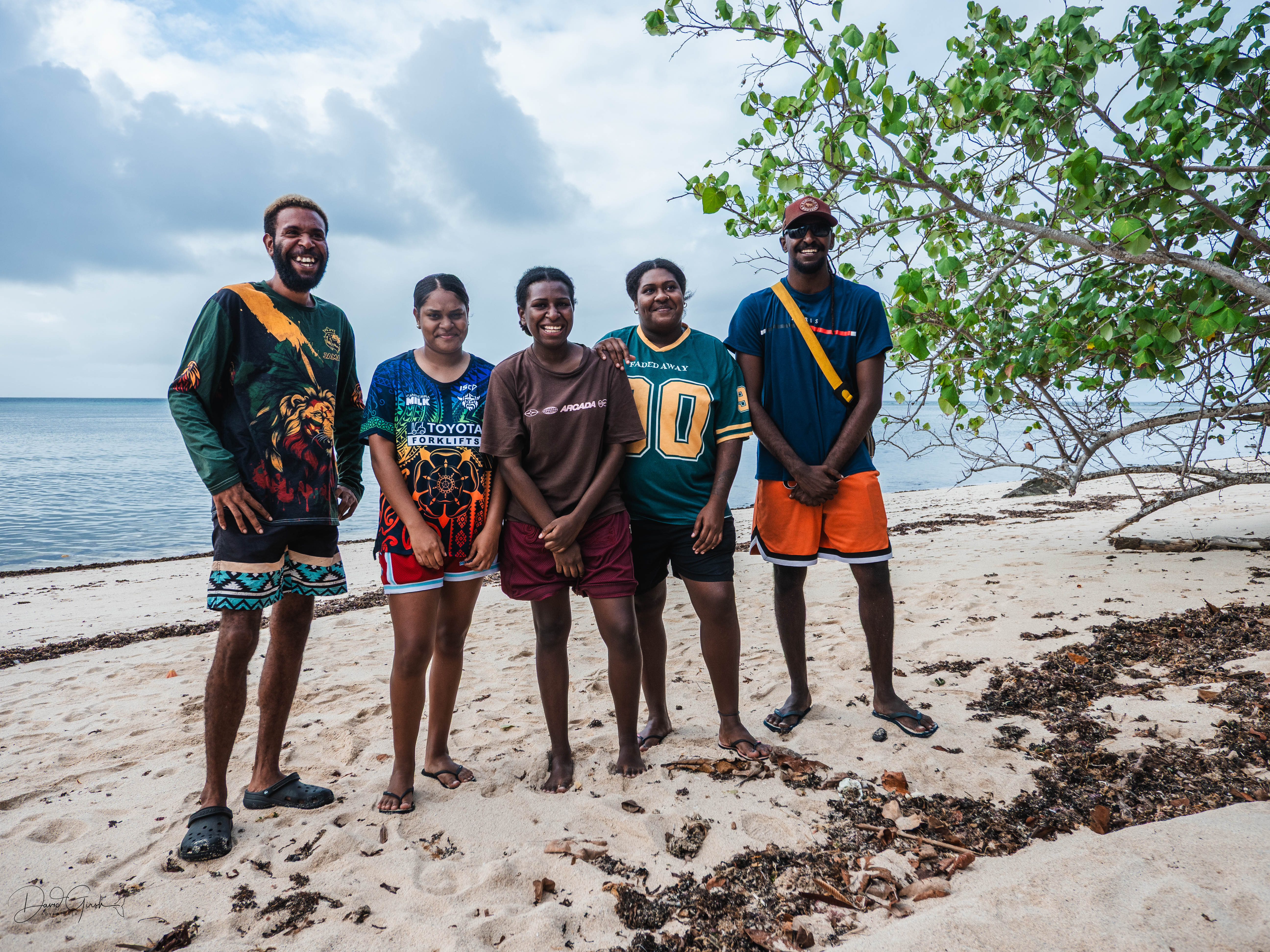 Five young Meriam trainees on the beach on Mer Island, Torres Strait